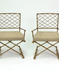 PAIR OF FRENCH-STYLE GILT IRON ARMCHAIRS WITH CUSHIONED SEATS