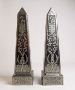 Pair of mirrored glass obelisks