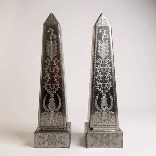 Pair of mirrored glass obelisks