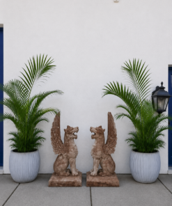 Pair of Monumental Neoclassical Cast Iron Winged Griffin Statues